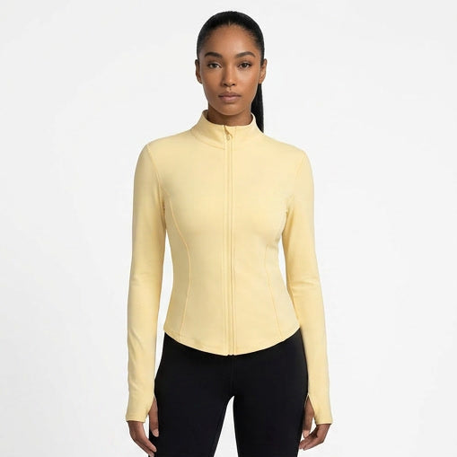 Woman wearing a beige long-sleeve top and black pants, shown from multiple angles on a white background.