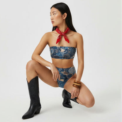 Four models wearing a matching blue and beige western-print bikini set styled with cowboy hats, boots, and a red neckerchief, posed in a clean white studio setting.