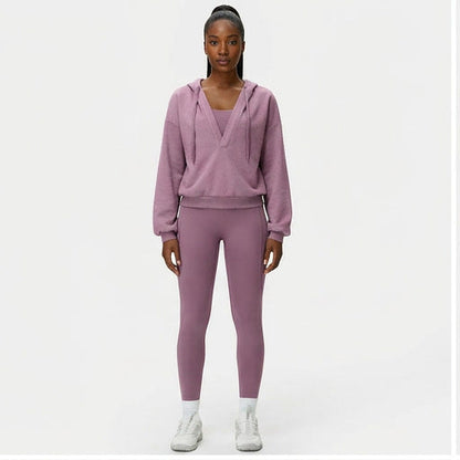 Collage of a person wearing a pink tracksuit from multiple angles on a white background.